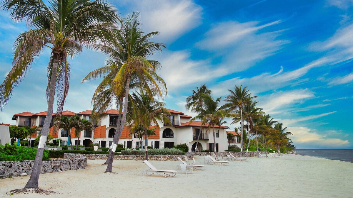 West Bay Villa | Romantic Walks on the Beach, Gorgeous Sunsets from Any Balcony.