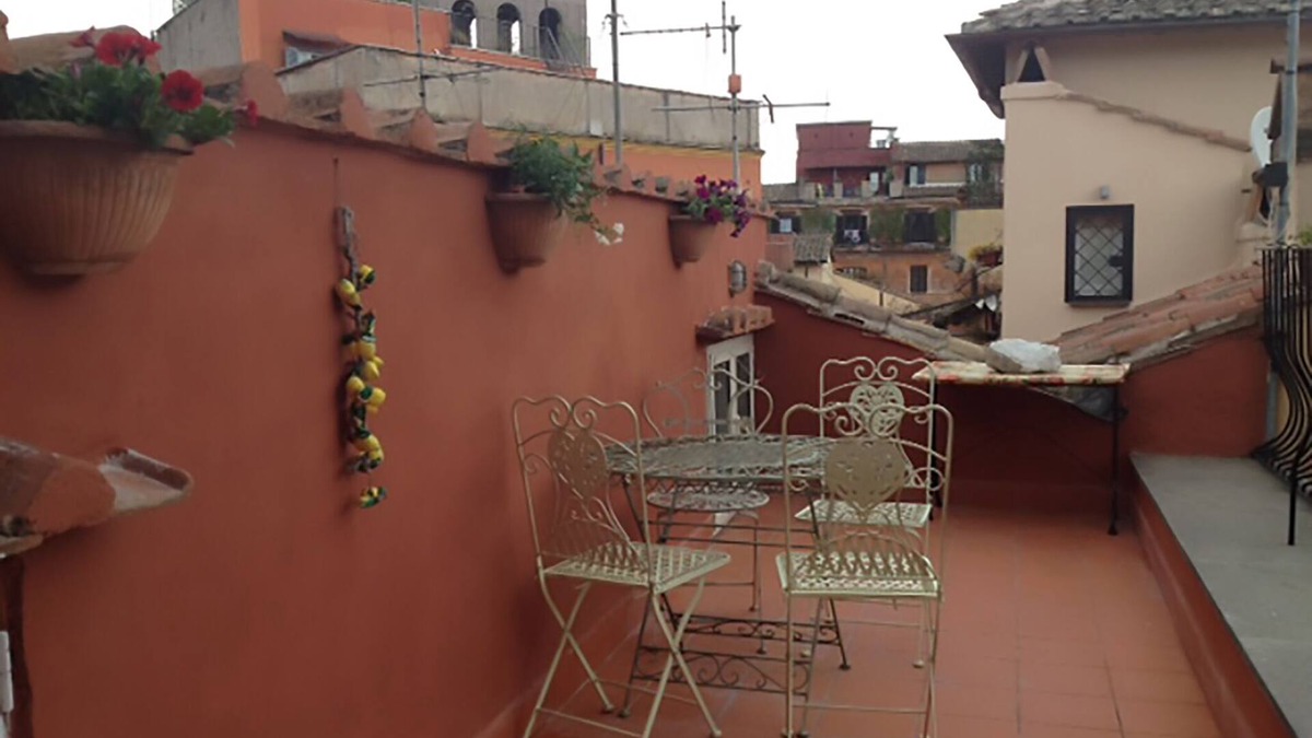 Rione V Ponte Apartment | Rome: Romantic penthouse of 700 with wifi, fireplace and a panoramic terrace in the heart of the historic center, near Piazza Navona