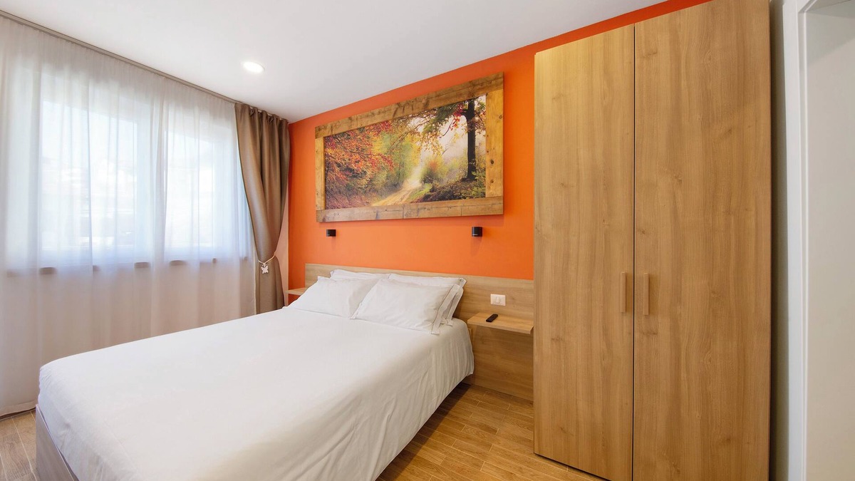 Domegge di Cadore Apartment | Room 'Camera M Rossa' with Lake View, Private Terrace and Wi-Fi