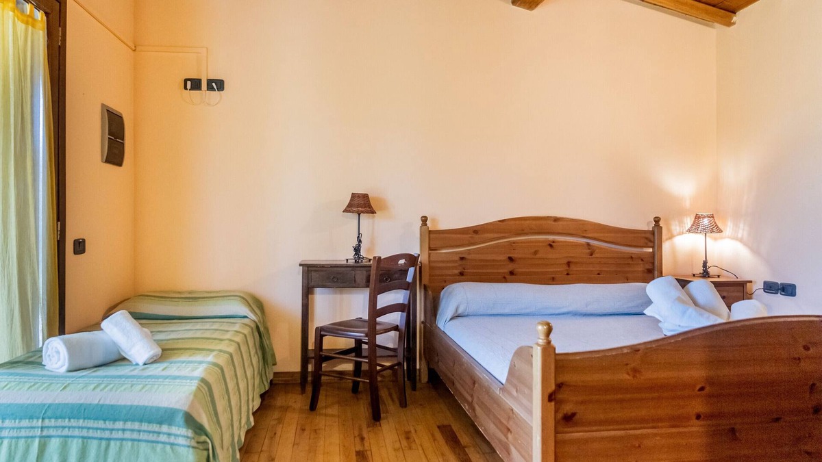 Grosseto Apartment | Room 'Libeccio' with Shared Pool and Air Conditioning