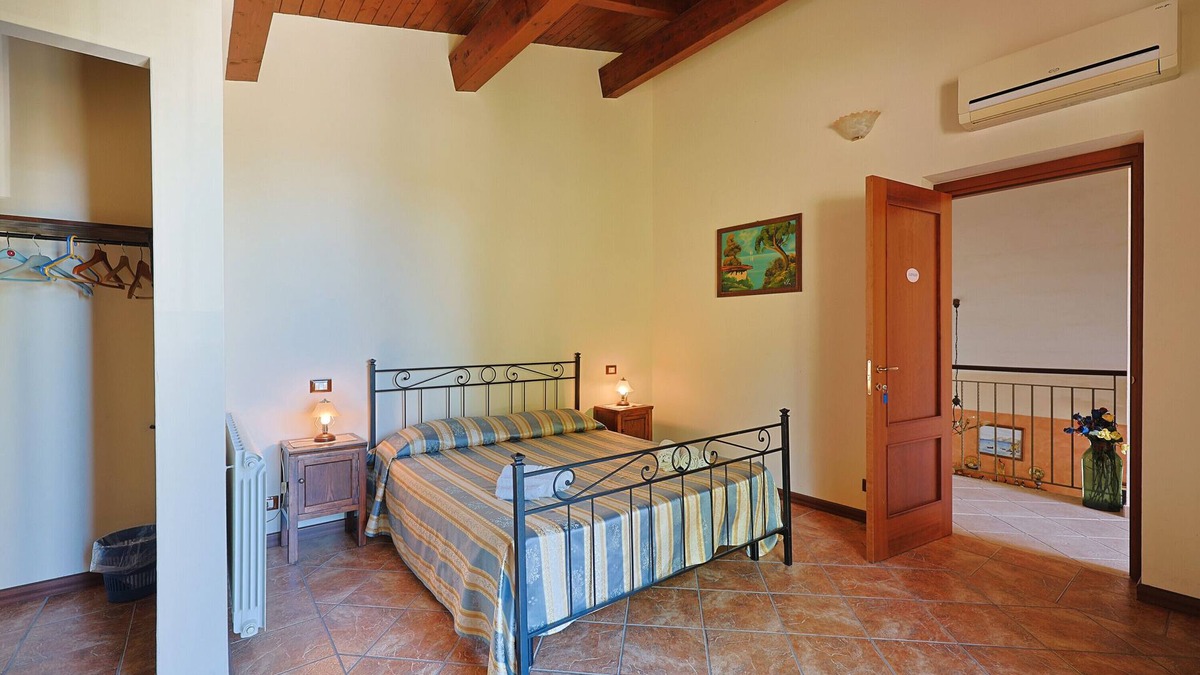Patti Apartment | Room 'Lipari' with terrace, shared garden and air conditioning