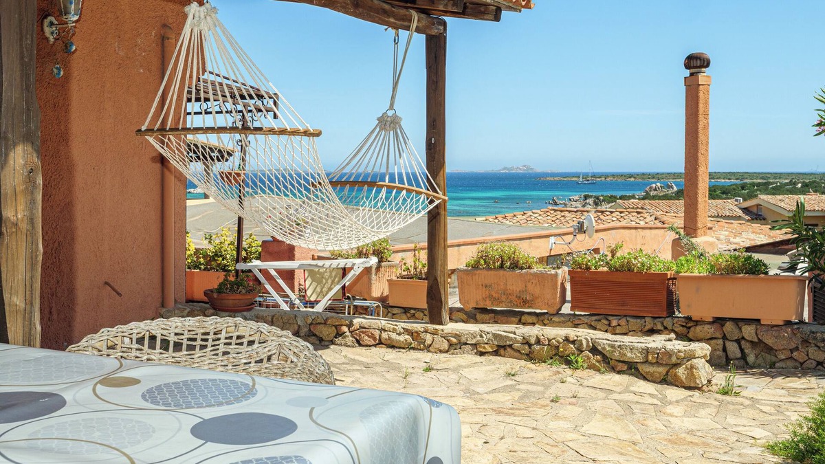 Golfo di Marinella Apartment | Room 'M1 Bouganville Vista Mare' with Sea View, Shared Pool and Private Terrace