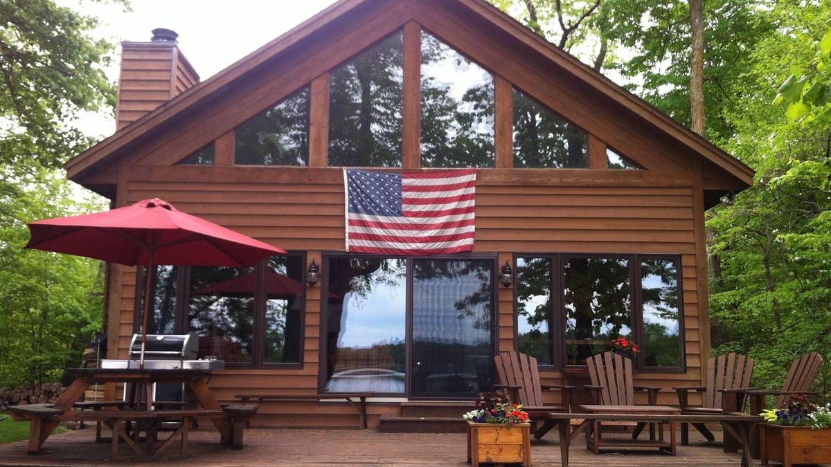 Grantsburg Cabin | Room to Relax on Big Wood Lake with Pontoon Boat Option! Available Year Round!