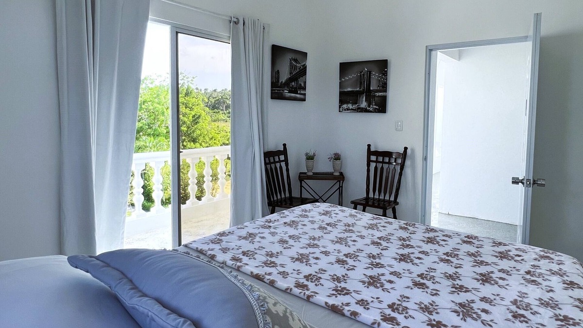 Cabrera Hotel | Room w/ocean view balcony next to the beach. 2 pools, fire pit, gardens & more!