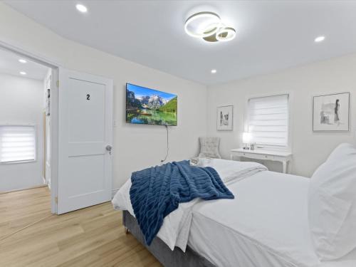 Old Mill House | Room with working space and queen bed in a Old mills luxury house