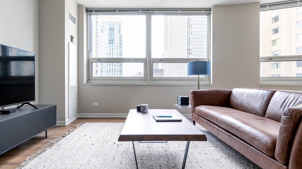 Rush and Division Apartment | Roomy River North 2BR w/Gym, Deck & Pool, walk to Mag Mile, by Blueground