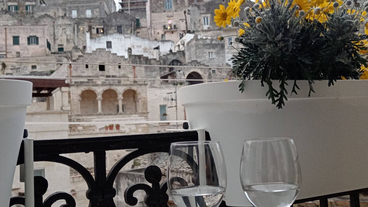 Matera Apartment | Roots - The window in the Sassi