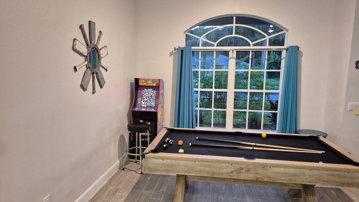 The Orchard House | Sadie's Daytona private pool home with 5 king beds , pool table and arcade games