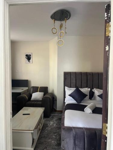 Eldoret House | Sahel Executive Studio apartment with separate kitchen and bathroom in another section from the main room for cheap accommodation in Elgon View near Eldoret sports club,Rapha Hospital, Naivas supermarket, rupha mall, and Eldoret International Airport