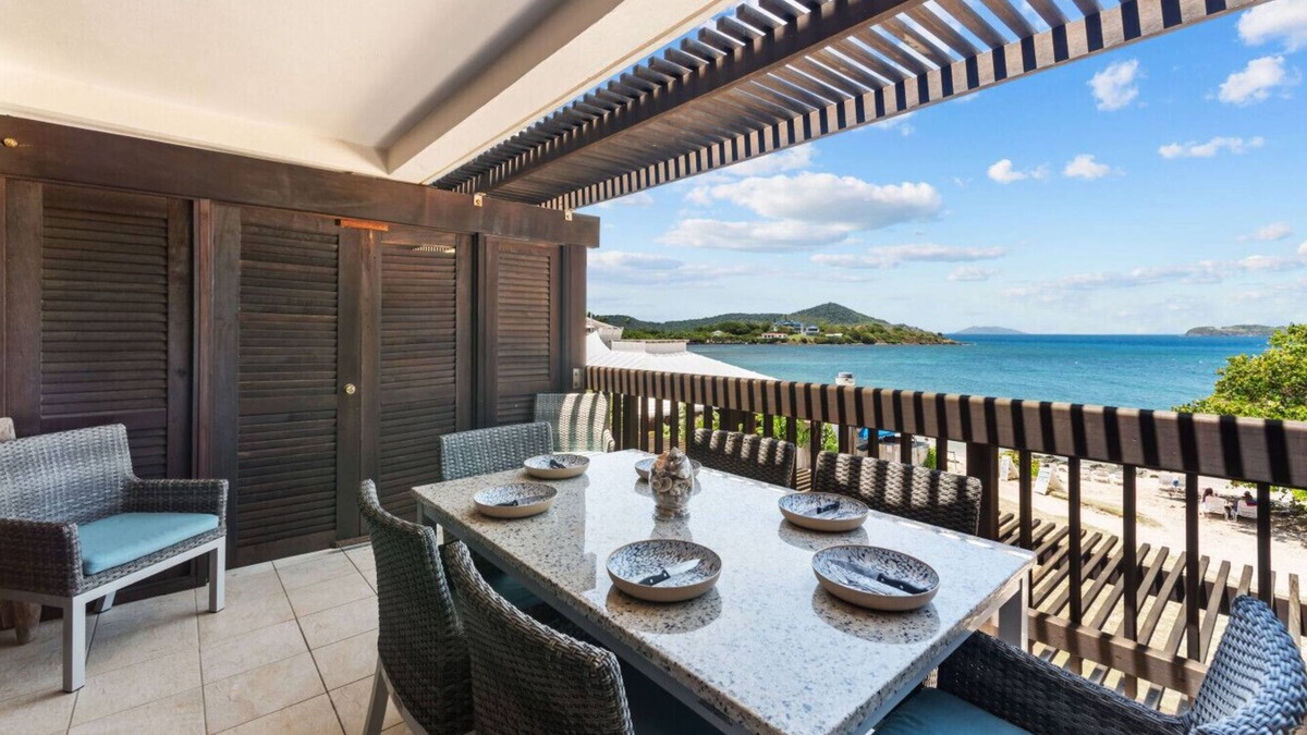 Cabes Point Apartment | Sapphire Dreams: Premier Beachfront Elegance in Building A of The Sapphire Beach Resort