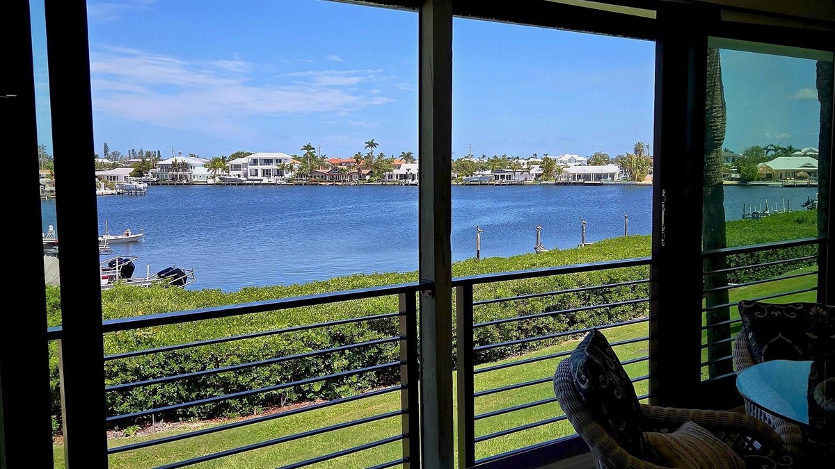Holmes Beach Condo | Seabreeze Sanctuary: 2BR/2BA Waterfront Condo - Stunning Views & Prime Location