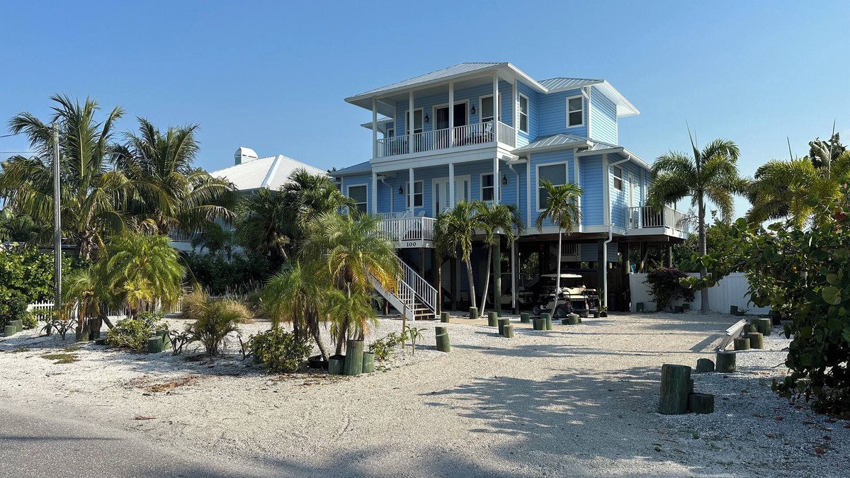 Palm Island House | SEACLUSION - Island Paradise Home Close to the Beach with Pool and Boat Dock