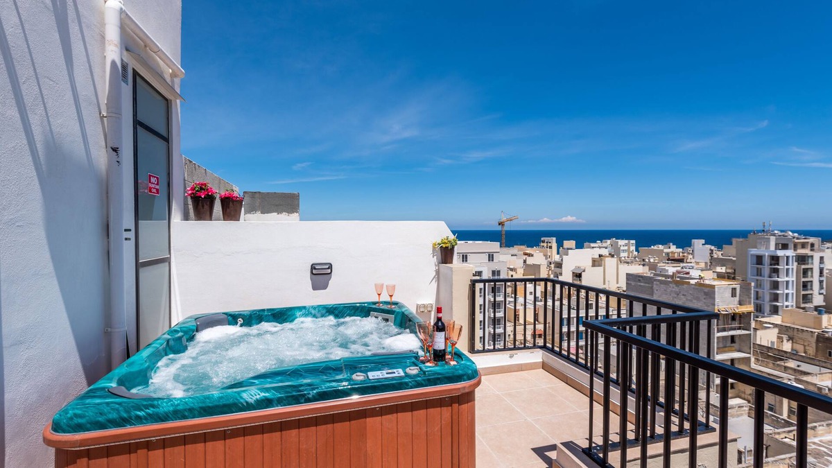 Bugibba Apartment | Seashells Penthouse Hot Tub Seaview by Getaways Malta
