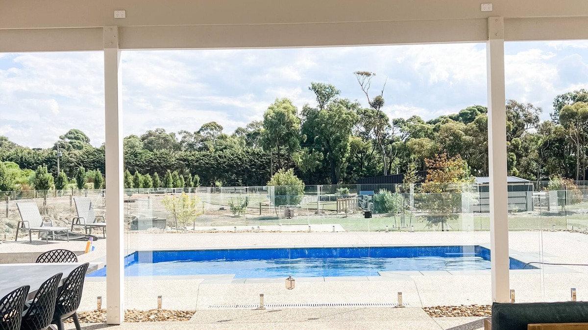 Indented Head House | Seaside Country Retreat w/magnesium pool and red brick fire place