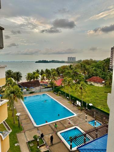 Tanjung Tanah Merah Apartment | Seaview PD Teluk Kemang Homestay