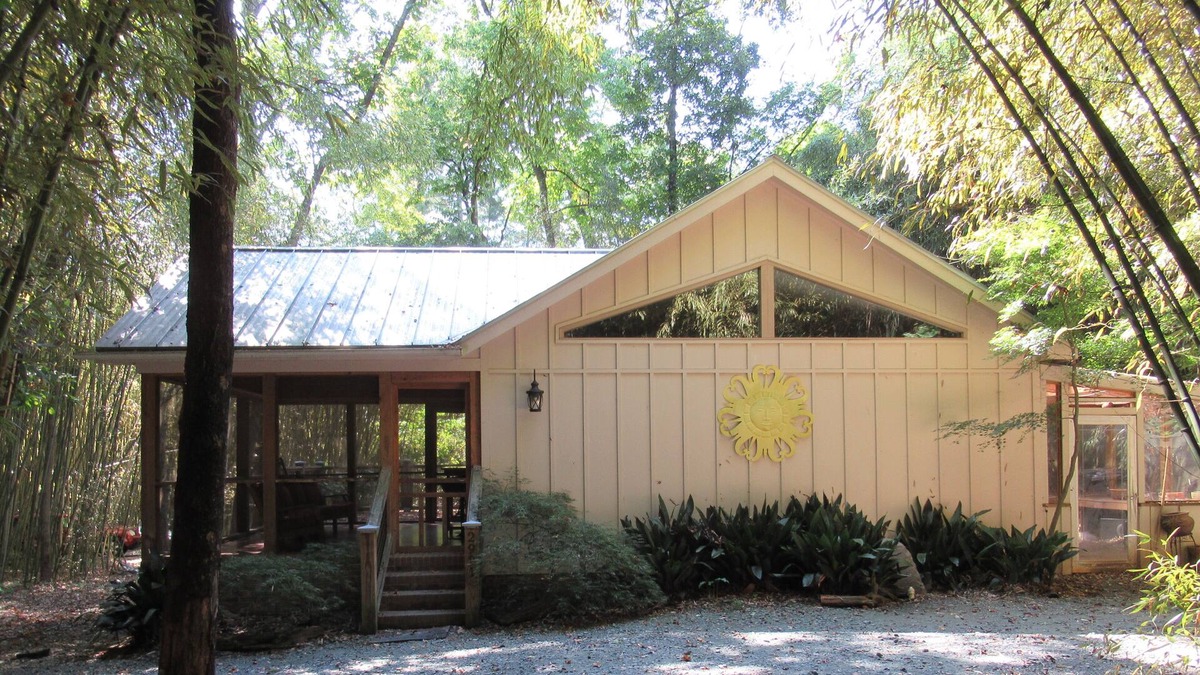 Burlington House | Secluded Bungalow Nestled In Bamboo Forest Down A Winding Private Drive by Pond