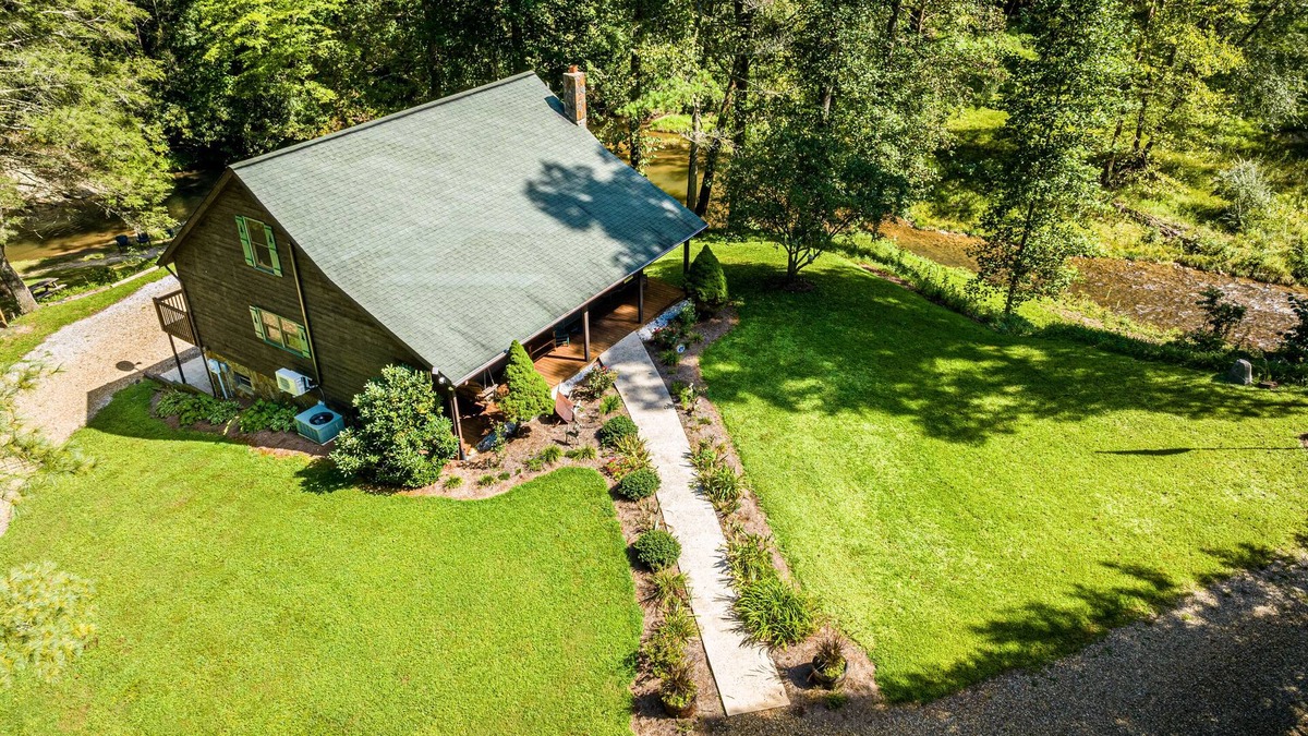 Yadkin Valley Cabin | Secluded Cabin on a mountain stream with water views from all rooms