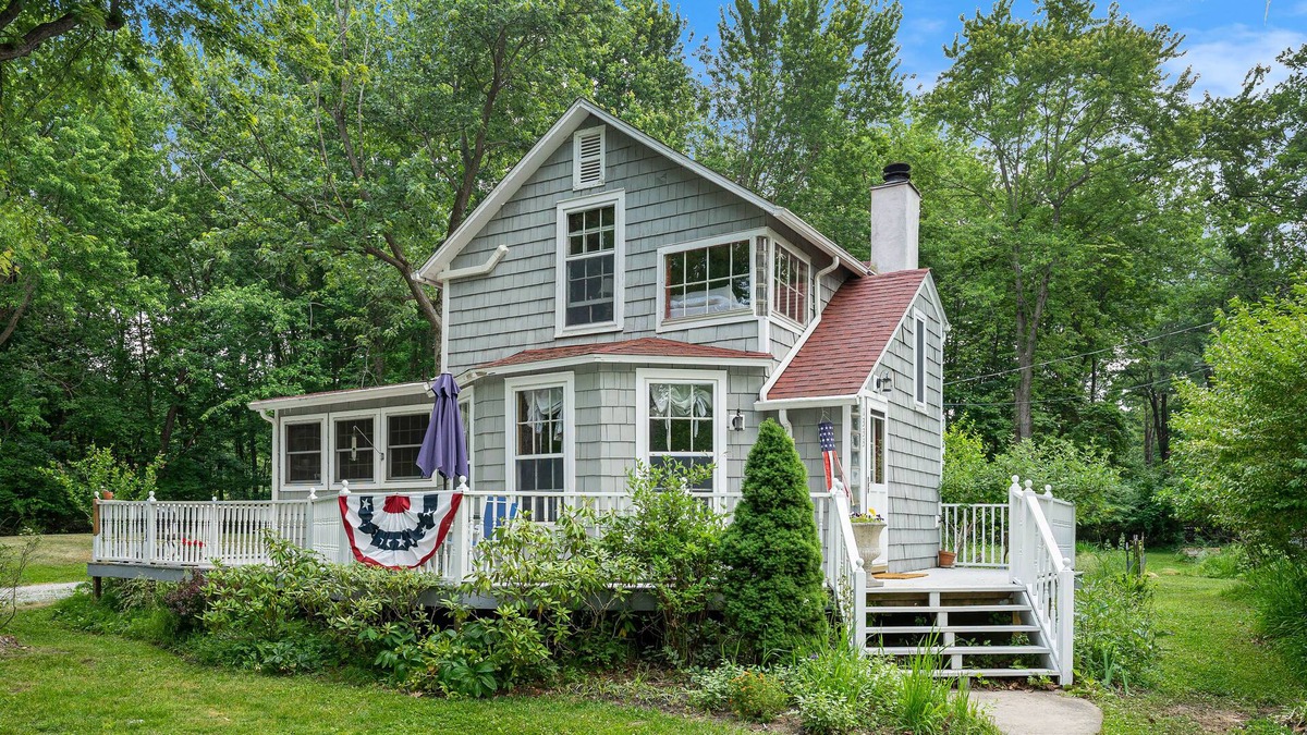 Fennville Cottage | Secluded lakefront cottage with sweeping views, huge deck, washer/dryer, & WiFi