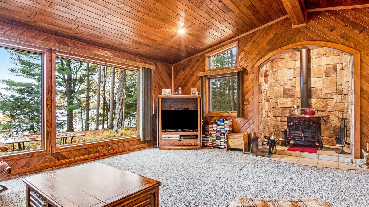 Lac du Flambeau House | Secluded lakefront home with kayaks, canoe, swim platform, firepit, & W/D