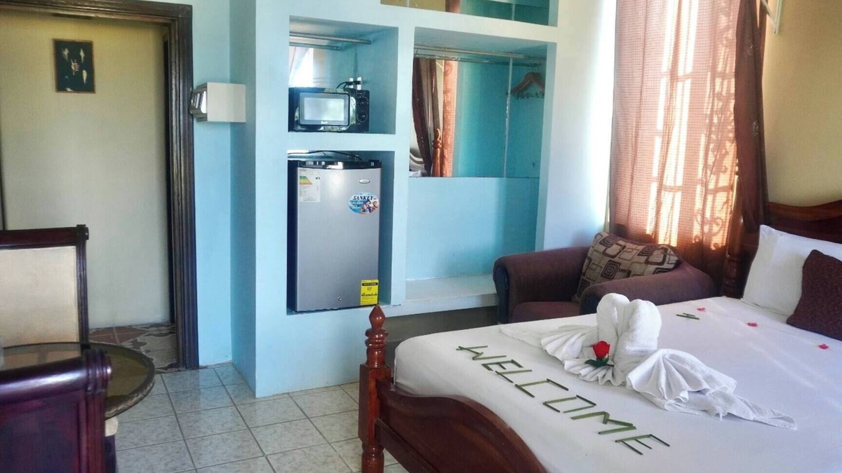 Belize City House | See Belize TRANQUIL SeaView Studio with Balcony, Pool, Deck & Kitchenette 2nd FL