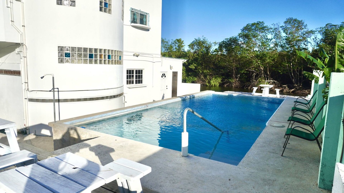 Belize City Apartment | See Belize TRANQUIL Sea View 2nd Floor Studio with Pool and Overwater Deck