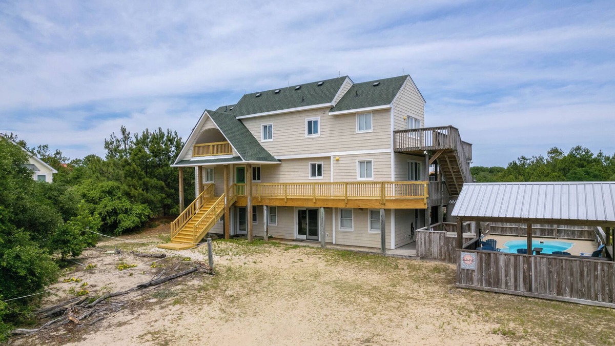Carova Beach House | See the wild horses from your spacious 8-bedroom home in the 4x4 Carova Beach