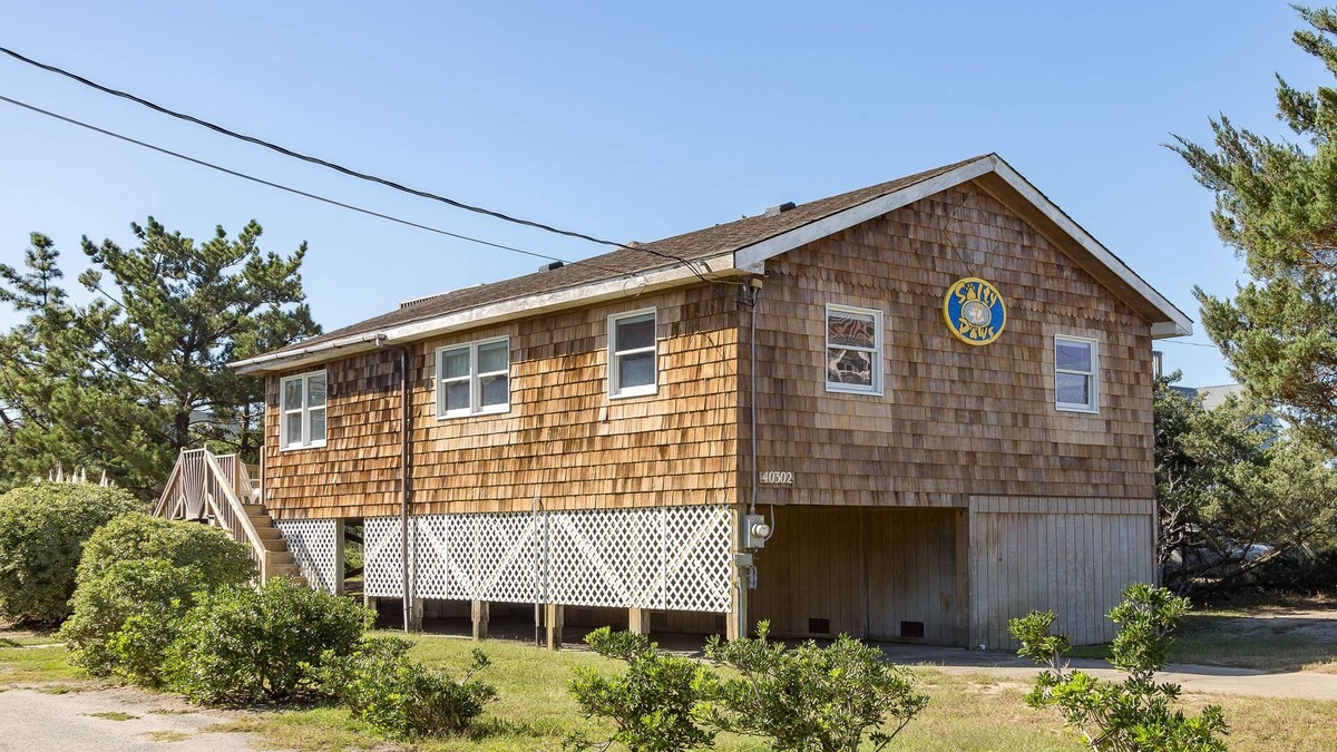 Ocean Isle Estates House | Semi-oceanfront dog-friendly home with private hot tub, decks & shared pool