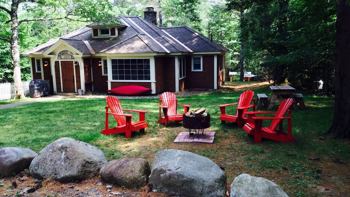 Lake Placid Club House | Short walk to village.with private wooded setting. EV Charger in parking area.