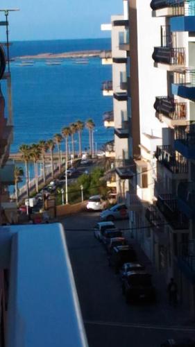 Bugibba Apartment | Side Sea View E, Steps Away to Bugibba Jetty, For the Blue Lagoon Boats and Other Islands
