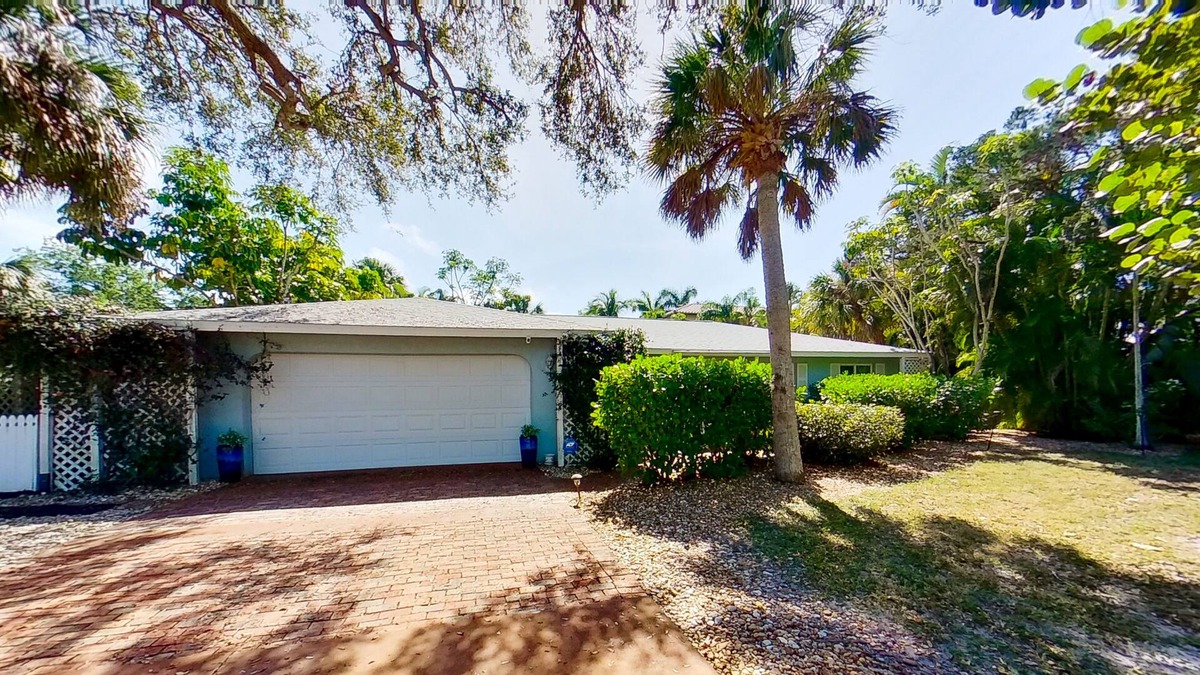 Bay Isle House | Siesta Key home with private pool, spa, fenced yard, screened lanai, & AC