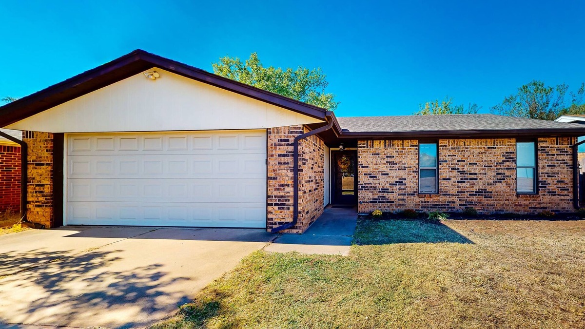 Stillwater House | Single-level home near OSU campus with fenced yard, patio, & grill