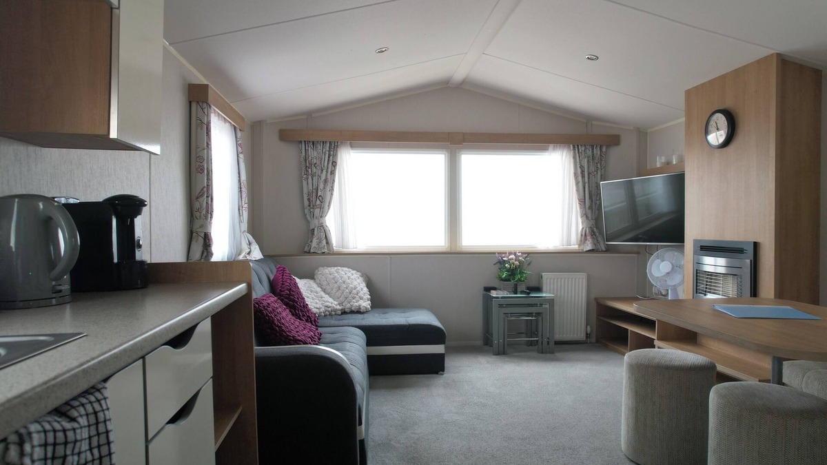 Kinmel Bay Cabin | Six Berth- Pet Friendly please ask ,Free WiFi ,Private secure decking,- Sea front with amazing views, Not to be missed