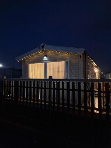 Kinmel Bay House | Six Berth- Pet Friendly please ask Free WiFi Private secure decking - Sea front with amazing views Not to be missed