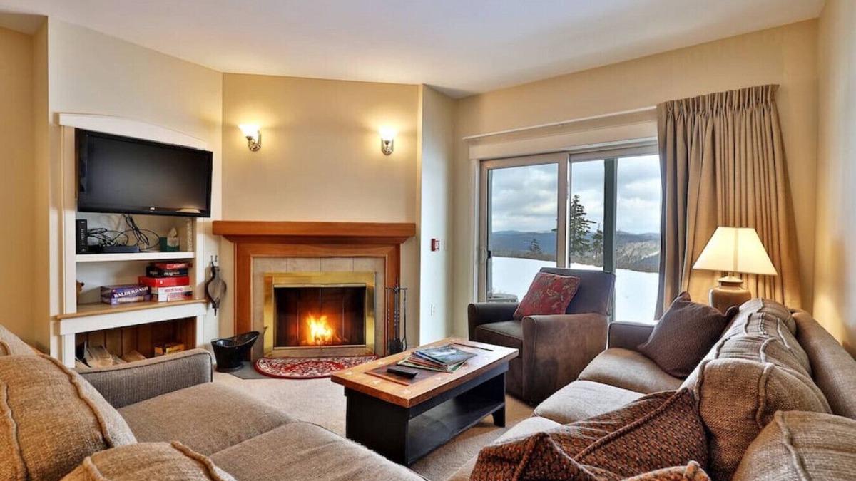 Ludlow House | Ski on/Ski off Solitude Condo with Fireplace