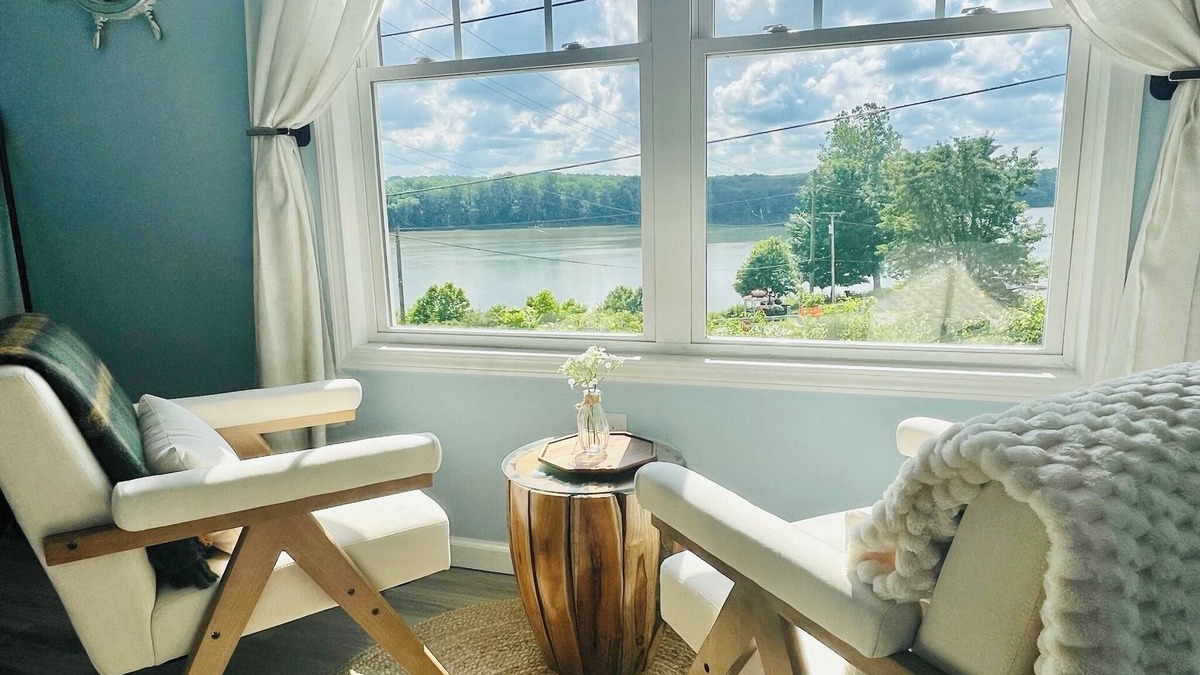 Aurora Condo | SKY Parlor sunrise and sunset views overlooking the river