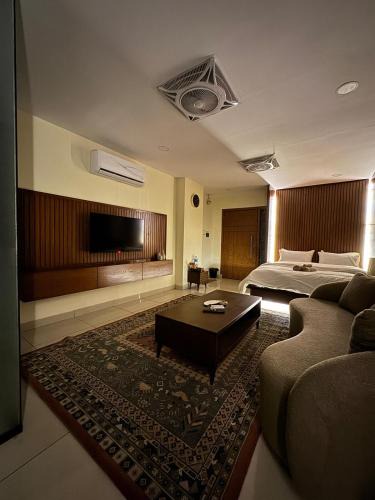 Islamabad Apartment | SkyLuxe Studio 2 with rooftop Pool & Self Check In