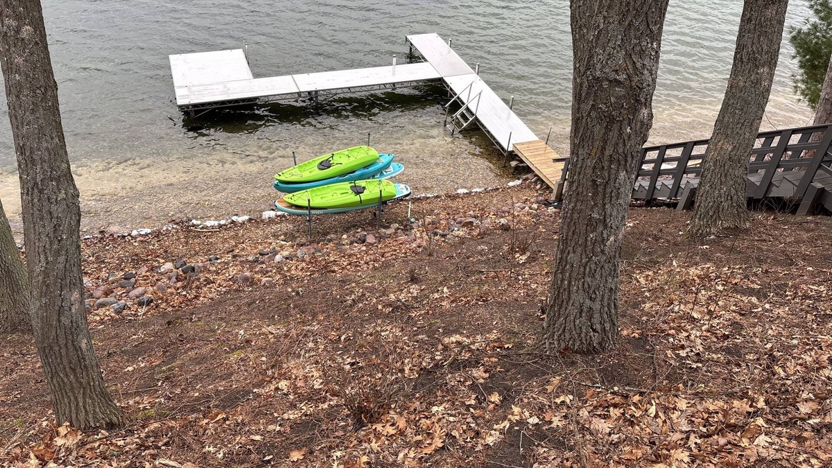 Wautoma House | Soak Up the Last Rays- Hot Tub Pier & Paddleboards