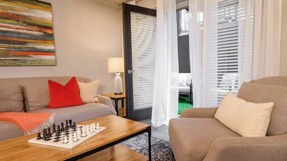 Old East Dallas Condo | Sophisticated 2-bed, 1.5-bath furnished condo in central Dallas featuring a private patio, tranquil garden views, and exclusive access to an award-winning courtyard with spa-inspired wellness amenities, relaxing lounge areas, and resort-style pool.