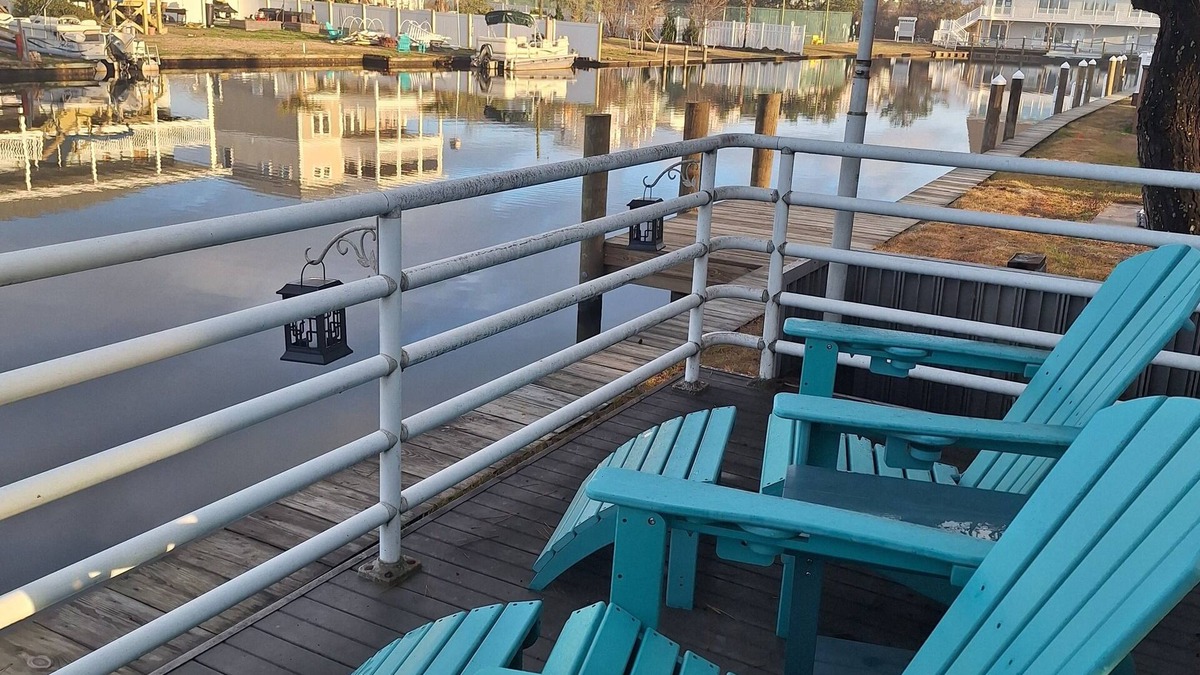 Sandbridge Cottage | Sophisticated waterfront Sandbridge cottage on Back Bay, minutes to the ocean.