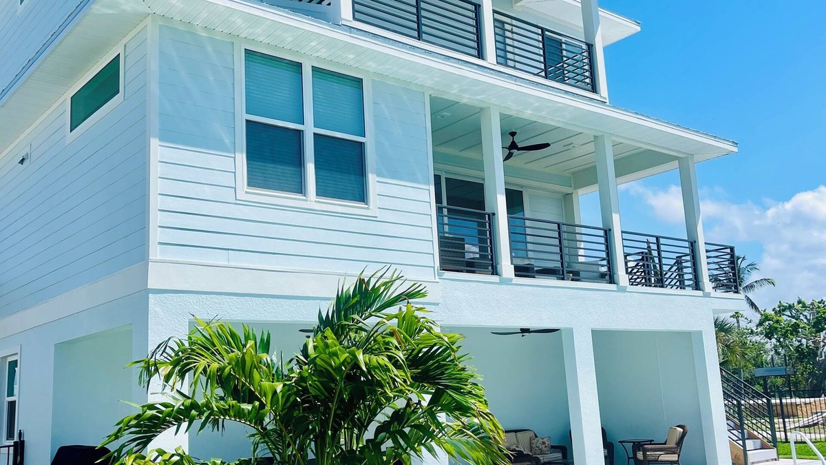 South Island House | Spacious 5-bedroom house w/Elevator, Canal, and heated pool Fort Myers Beach