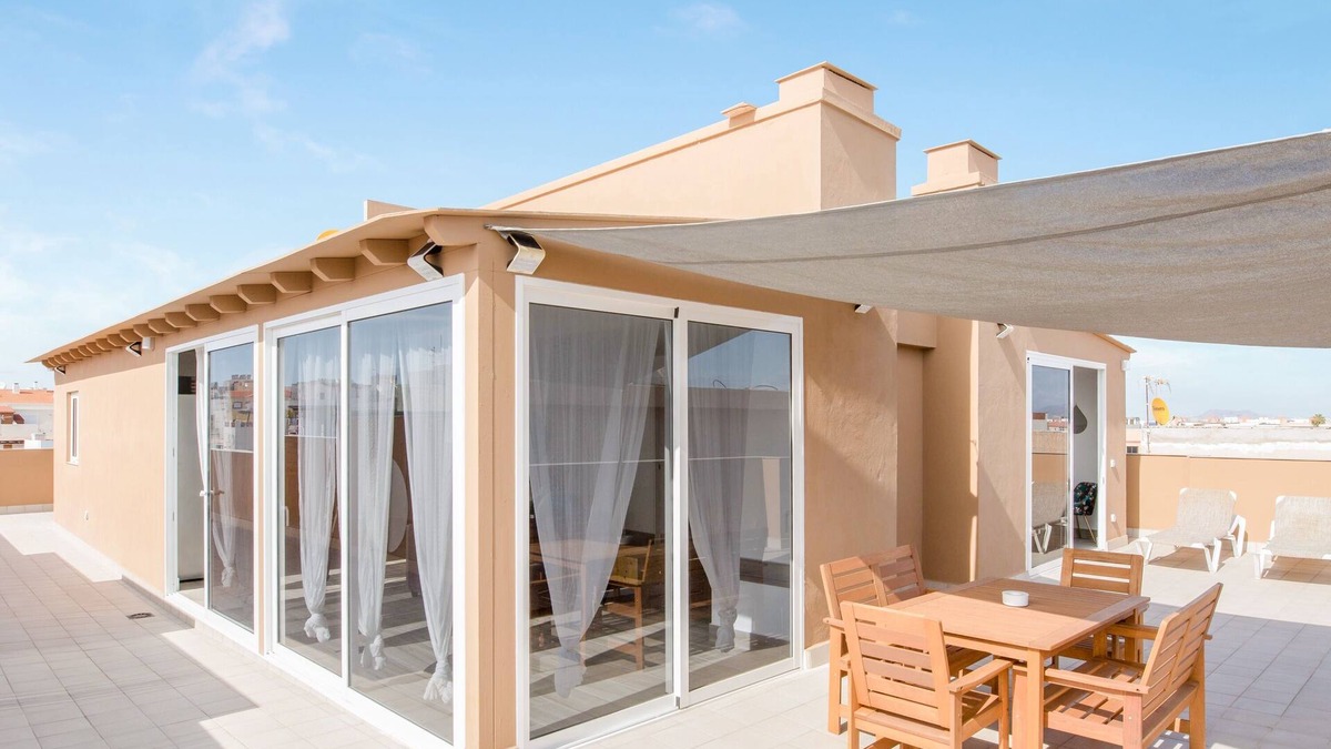 Corralejo Apartment | Spacious Apartment “Ático deluxe Corralejo centro” Close to the Beach with Sea View