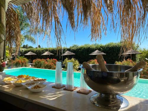 Pozzallo Apartment | Spacious apartment in Pozzallo, sea view, shared pool