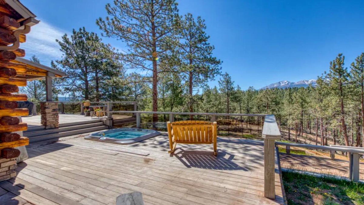 Woodland Park Cabin | Spacious cabin in the woods w/a private hot tub, deck, & fireplace SUV needed