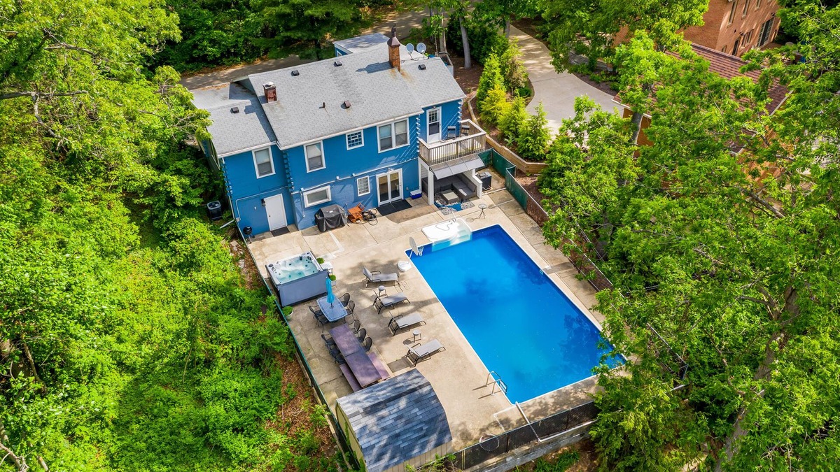 Grand Beach House | Spacious, dog-friendly home with a gas fireplace, pool, hot tub, & golf carts