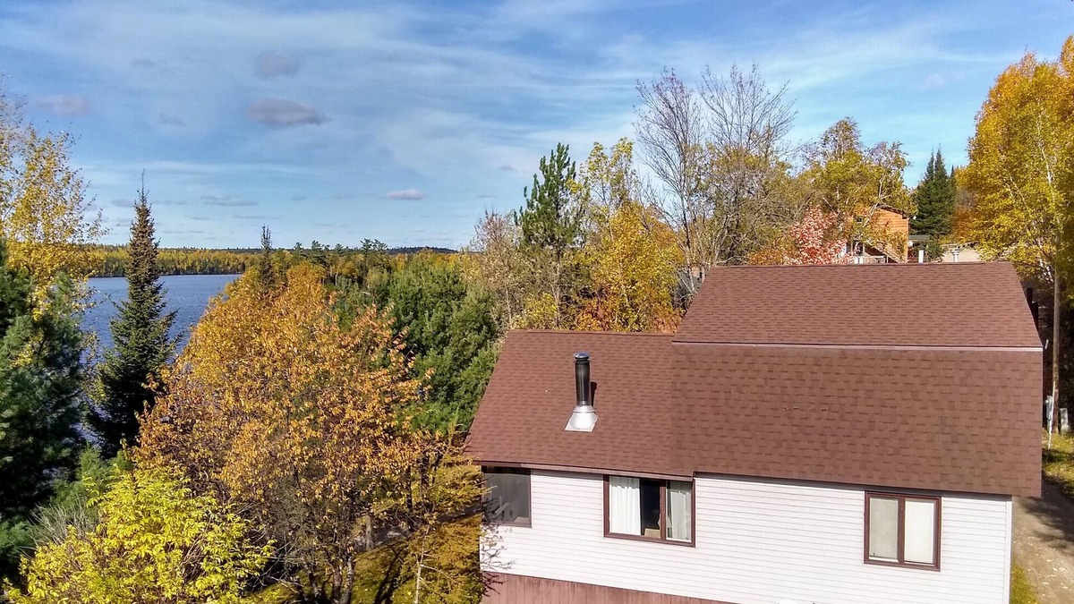 Ely Cabin | Spacious Group Cabin Overlooking Moose Lake with Vaulted Ceilings, Loft & Porch
