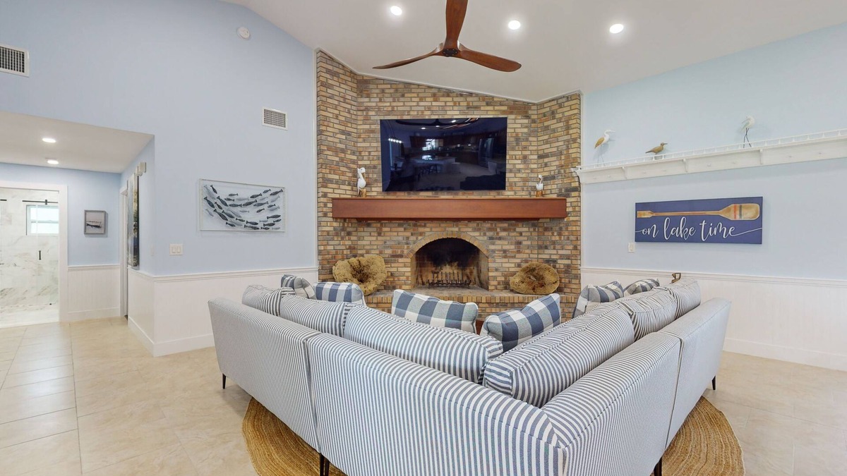Lake Placid House | Spacious home with enclosed pool, private lake access, and game room.