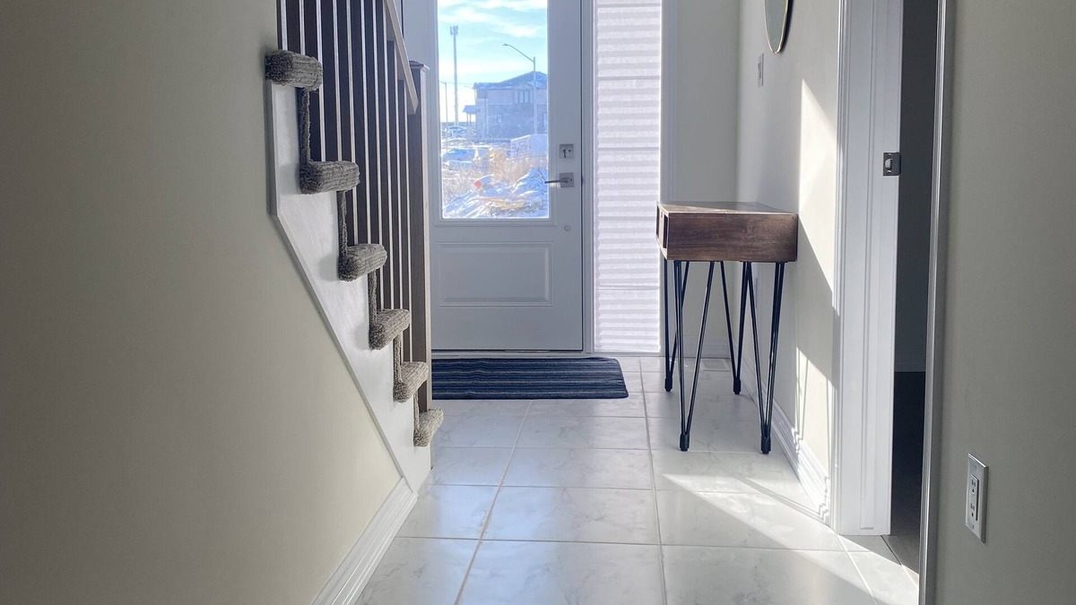 Cambridge House | Spacious luxurious townhouse with double car garage.