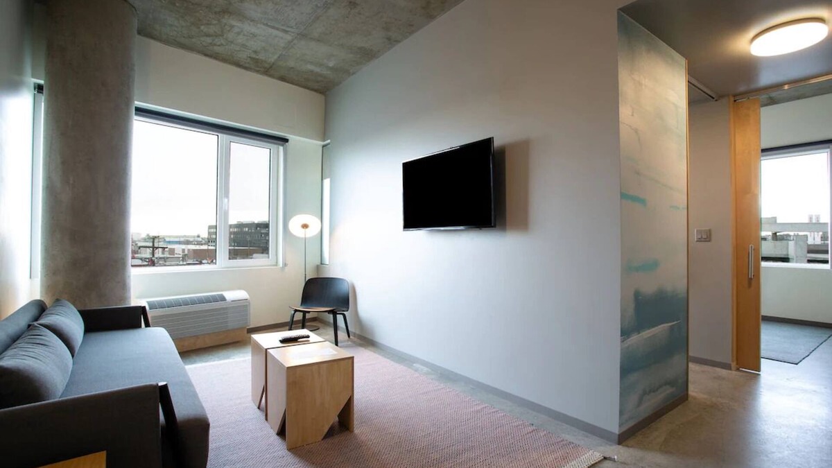 River North Art District Hotel | Spacious Suite with Stunning Market Views, Chic Decor, and Modern Amenities