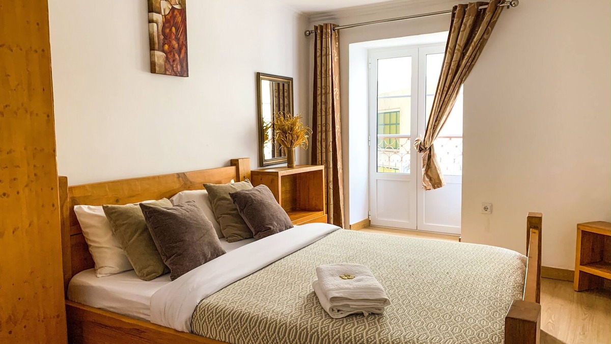 Mouraria Apartment | Spacious Vintage 5-Bedroom Apartment in Downtown Lisbon Handmade Beds, Sleeps 11