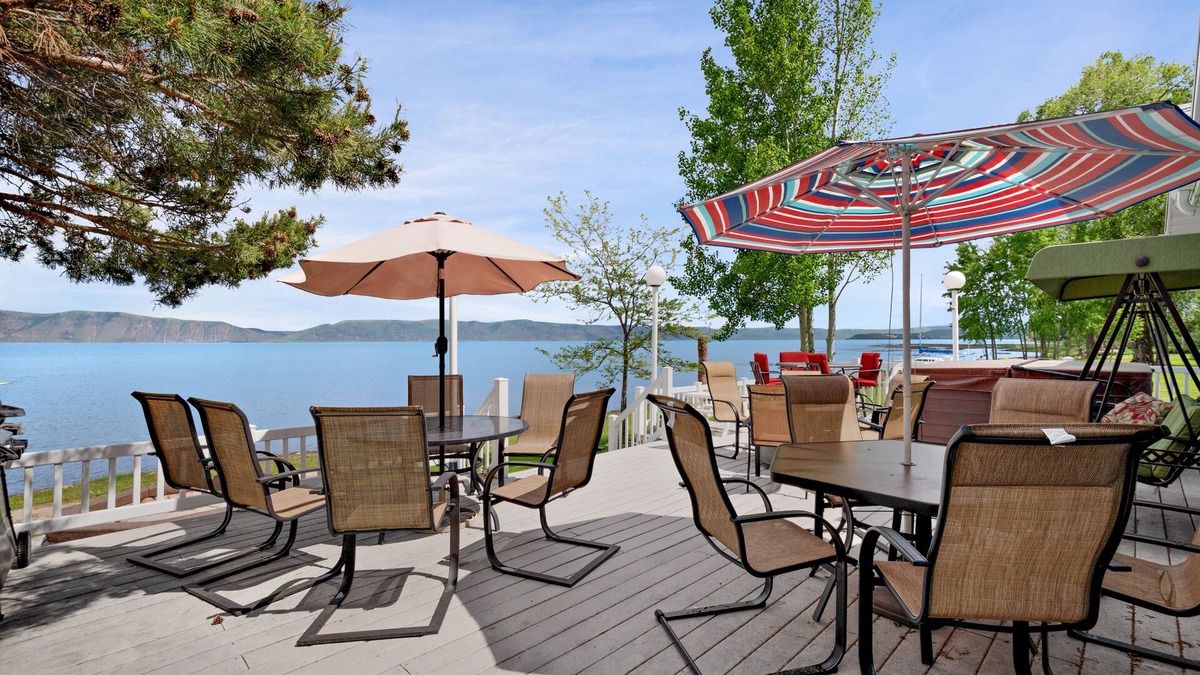 Garden City House | Spacious Waterfront Getaway with Private Hot Tub, Furnished Deck, and Game Room